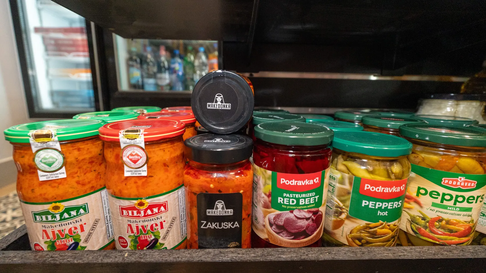 Biljana ajvar, Makedonka zakuska and Podravka jars on the WYN MKT shelf