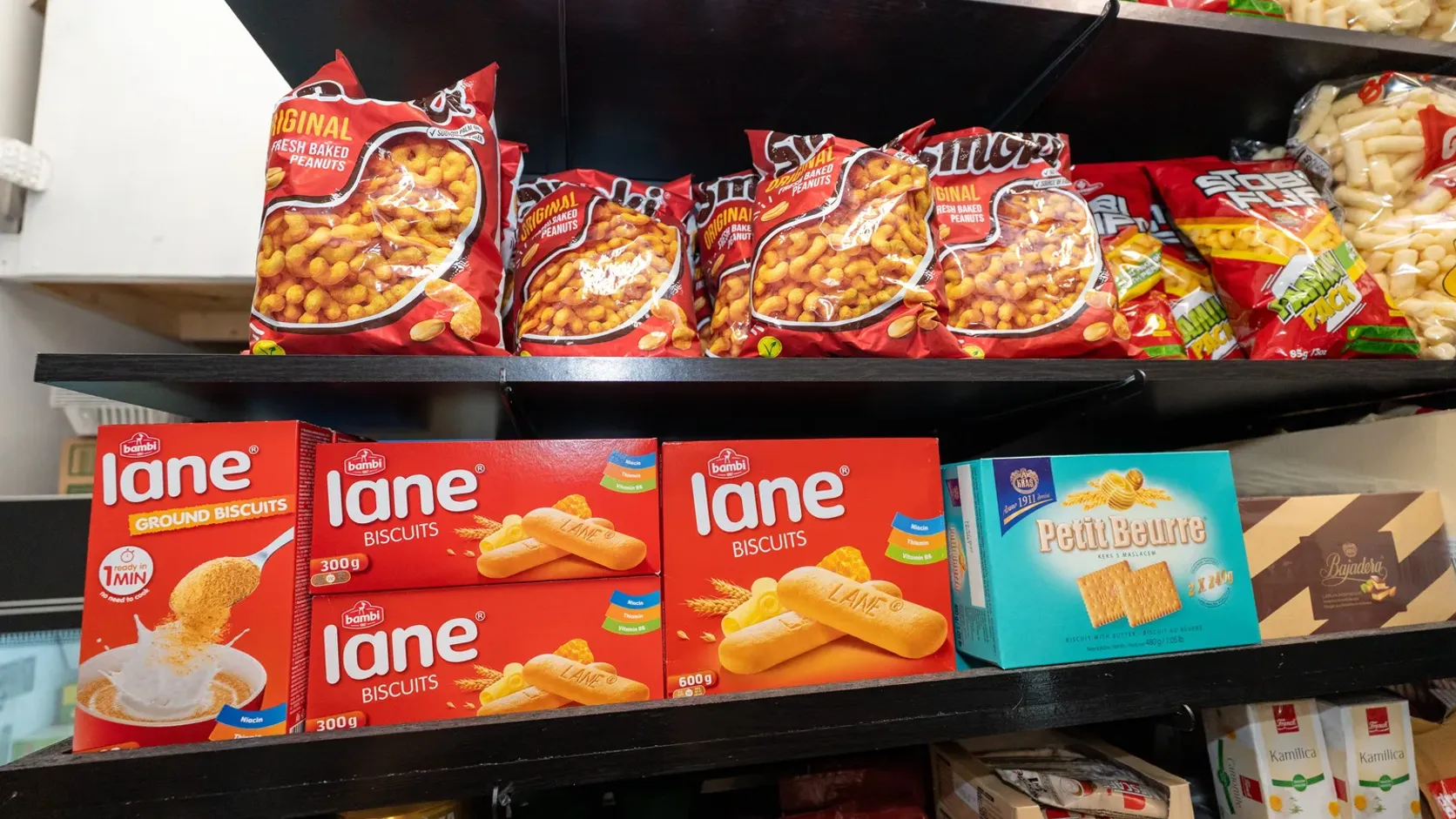 Bags of Smoki above Lane biscuits and Petit Beurre on the WYN MKT shelf